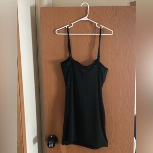 Black mini dress with split on side